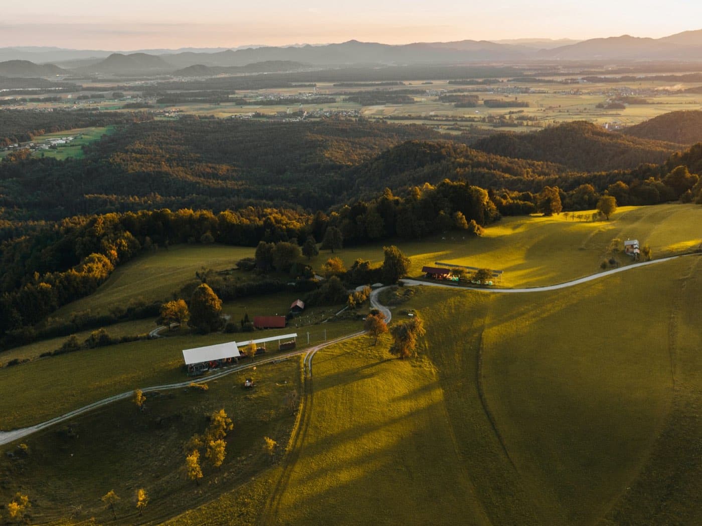Golden-hour light over the rolling hills and fields of the Dales